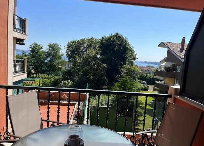 Apto En Urbanizacion Isla De Ons Con Garaje, Piscina Y Vistas Al Mar Санхенхо